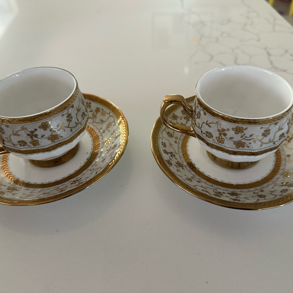 Elegant Gold and White Tea Cup Set
